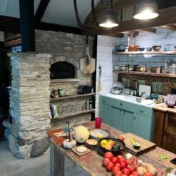 Temp-Cast Indoor Fireplace And Pizza Oven Combo -Primo Store TempcastFireplaceHeaterandBakeOvenSide