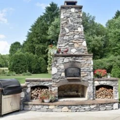 Round Grove Fiesta Outdoor Pizza Oven Fireplace Combo -Primo Store roundgrovefiestawithstonefinishandwoodboxes